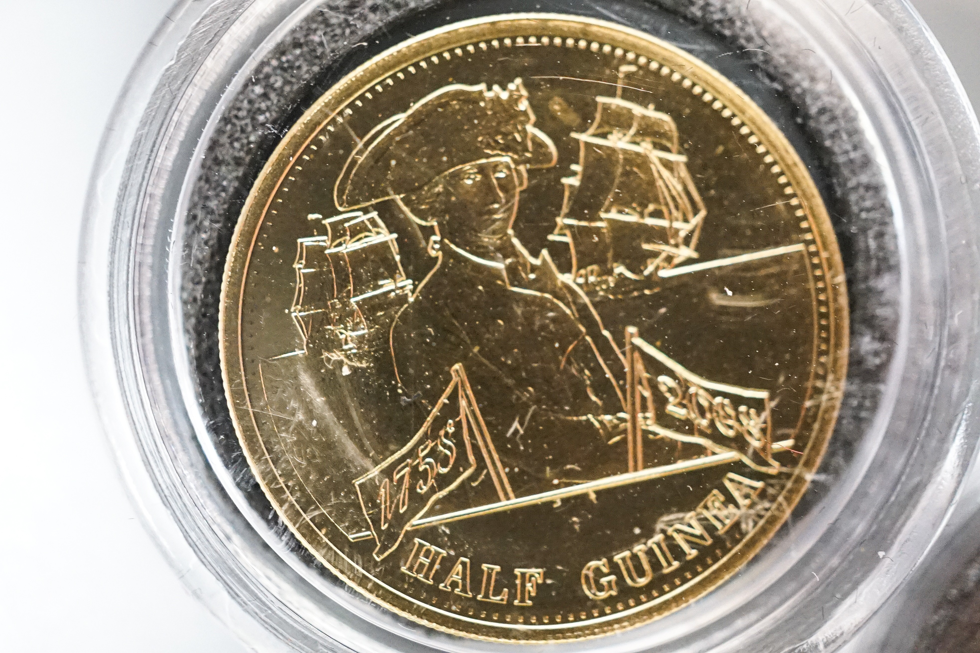 A London mint Tristan da Cunha gold half guinea, Brilliant Unc, and a similar gold piedfort one crown, cased with certificates (2)